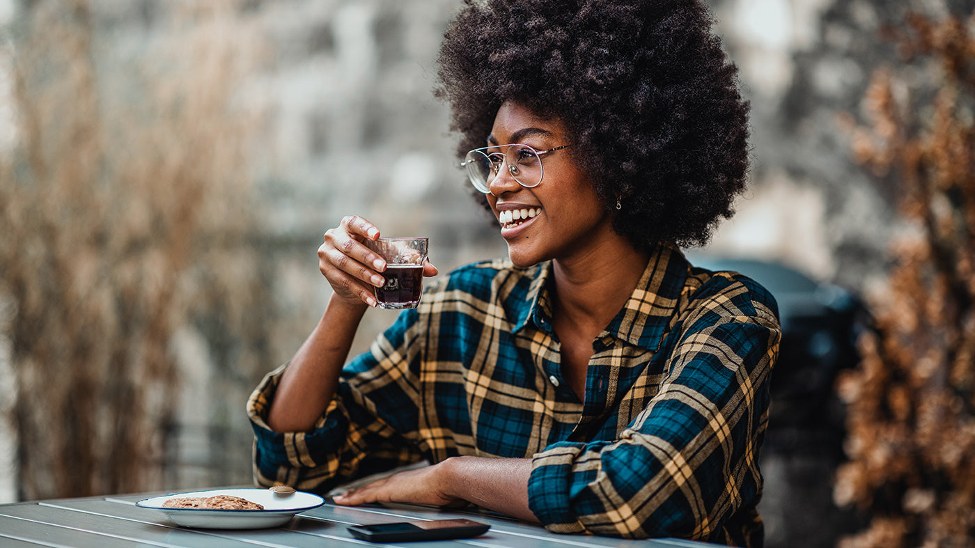 Woman Smiling Drinking Commercially Compostable Coffee Pod Coffee
